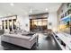 Bright and airy living room with large windows and comfortable seating at 6450 E Bent Tree Dr, Scottsdale, AZ 85266