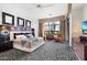 Spacious main bedroom with large windows and a luxurious feel at 6450 E Bent Tree Dr, Scottsdale, AZ 85266