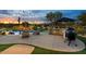 Inviting pool area with outdoor kitchen and lounge seating at 6450 E Bent Tree Dr, Scottsdale, AZ 85266