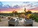Relaxing pool area with waterfall feature and comfortable seating at 6450 E Bent Tree Dr, Scottsdale, AZ 85266