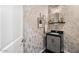 Elegant powder room with designer wallpaper and modern vanity at 6450 E Bent Tree Dr, Scottsdale, AZ 85266
