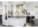 Stylish wet bar with granite countertop and ample storage at 6450 E Bent Tree Dr, Scottsdale, AZ 85266