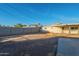 House backyard with patio, shed, and a clear view at 1025 S Lola Ln, Tempe, AZ 85281