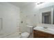 Clean bathroom with shower and wood vanity at 1025 S Lola Ln, Tempe, AZ 85281