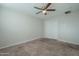 Simple bedroom with ceiling fan and carpet at 1025 S Lola Ln, Tempe, AZ 85281