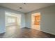 Hardwood floors and open views to kitchen and dining areas at 1025 S Lola Ln, Tempe, AZ 85281
