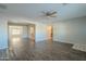 Open concept living room with hardwood floors and kitchen view at 1025 S Lola Ln, Tempe, AZ 85281