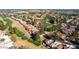 Wide aerial view of community with golf course and landscaping at 11806 N 40Th Pl, Phoenix, AZ 85028