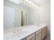 Bathroom boasts double sinks and a large vanity mirror at 11806 N 40Th Pl, Phoenix, AZ 85028