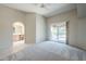 Bedroom with carpet, access to bathroom and outside at 11806 N 40Th Pl, Phoenix, AZ 85028