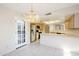 Dining area with access to the kitchen and patio at 11806 N 40Th Pl, Phoenix, AZ 85028