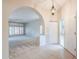 Bright entryway with arched passage to living room at 11806 N 40Th Pl, Phoenix, AZ 85028