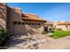 Spanish style home with a two-car garage and manicured lawn at 11806 N 40Th Pl, Phoenix, AZ 85028