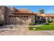 Spanish style home with a two car garage and lush landscaping at 11806 N 40Th Pl, Phoenix, AZ 85028