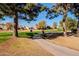 A scenic pathway alongside a beautifully landscaped golf course at 11806 N 40Th Pl, Phoenix, AZ 85028