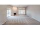 Living room with corner fireplace and sliding glass doors to the backyard at 11806 N 40Th Pl, Phoenix, AZ 85028