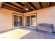 Covered patio with brick flooring and sliding glass doors at 11806 N 40Th Pl, Phoenix, AZ 85028