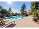 Inviting community pool with ample lounge chairs for relaxation at 11806 N 40Th Pl, Phoenix, AZ 85028