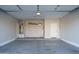 Spacious garage with overhead storage at 12145 W Briles Rd, Peoria, AZ 85383