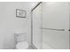 Clean bathroom with a shower stall and white toilet at 1372 W Crane Dr, Chandler, AZ 85286