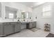 Spa-like bathroom with double vanity and large mirrors at 1372 W Crane Dr, Chandler, AZ 85286