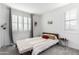 Spacious bedroom with a queen bed and ample natural light at 1372 W Crane Dr, Chandler, AZ 85286