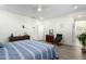 Bright bedroom with king-size bed and en-suite bathroom at 1372 W Crane Dr, Chandler, AZ 85286