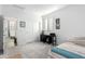 Bright bedroom with a bed, desk, and large closet at 1372 W Crane Dr, Chandler, AZ 85286