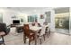 Dining area with glass top table and access to the backyard at 1372 W Crane Dr, Chandler, AZ 85286