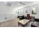 Versatile loft area, furnished as an office and sitting area at 1372 W Crane Dr, Chandler, AZ 85286