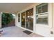 Covered patio with access to the kitchen and backyard at 1372 W Crane Dr, Chandler, AZ 85286