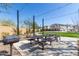 Community picnic tables with string lights at 1372 W Crane Dr, Chandler, AZ 85286