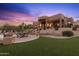 Landscaped backyard with a custom pool and spa at 13931 E Peak View Rd, Scottsdale, AZ 85262