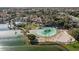Resort-style community with lagoon pool, beach area, and clubhouse at 1633 E Lakeside Dr # 113, Gilbert, AZ 85234