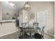 Bright dining area with a glass table and four chairs at 1633 E Lakeside Dr # 113, Gilbert, AZ 85234