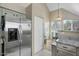 Kitchen with stainless steel refrigerator and pantry at 1633 E Lakeside Dr # 113, Gilbert, AZ 85234