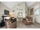 Spacious living room features a fireplace and comfortable seating at 1633 E Lakeside Dr # 113, Gilbert, AZ 85234