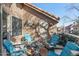 Private patio with seating area and surrounding trees at 1633 E Lakeside Dr # 113, Gilbert, AZ 85234