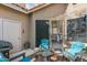 Cozy patio with seating, a grill and view into the home at 1633 E Lakeside Dr # 113, Gilbert, AZ 85234
