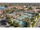 Community tennis courts with surrounding landscape at 1633 E Lakeside Dr # 113, Gilbert, AZ 85234