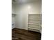 Functional pantry with ample shelving for storage at 17625 W Sanna St, Waddell, AZ 85355