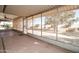 View of the screened patio and backyard at 17827 N Conquistador Dr, Sun City West, AZ 85375