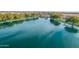 Aerial view of a sparkling lake in a residential community at 20190 N Wilford Ave, Maricopa, AZ 85138