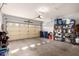 Attached garage with storage shelving and opener at 2101 S Yellow Wood -- # 73, Mesa, AZ 85209