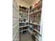 Well-organized pantry with ample shelving for storage at 2507 N Casa Grande Ave, Casa Grande, AZ 85122