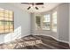 Bright bedroom with bay window and wood-look flooring at 2866 E Sports Ct, Gilbert, AZ 85298