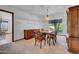 Dining area with wood furniture, chandelier, and large window at 350 W Mclellan Rd # 7, Mesa, AZ 85201