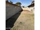 Large grassy backyard with block wall and gate at 4643 W Laurel Ln, Glendale, AZ 85304
