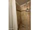 Clean bathroom with tiled shower and curtain at 4643 W Laurel Ln, Glendale, AZ 85304