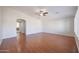 Living room with wood floors and ceiling fan at 5124 W Gwen St, Laveen, AZ 85339